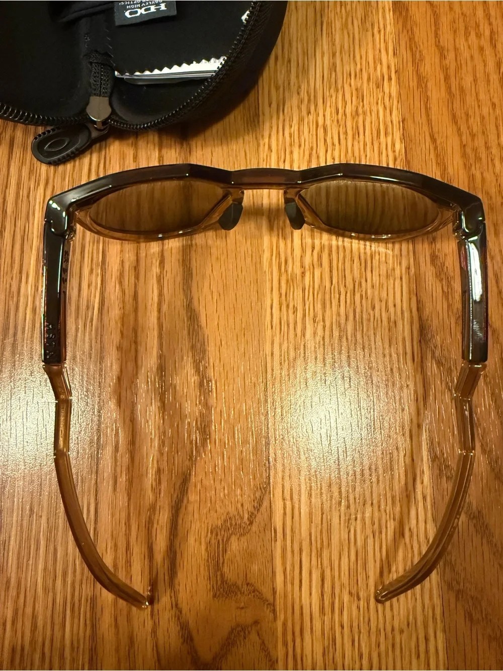 Oakley Translucent Honey Brown Round Frame Sunglasses